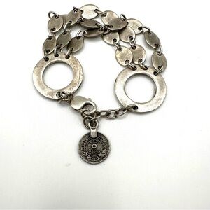 Silver circle dangle link bracelet with a coin charm
